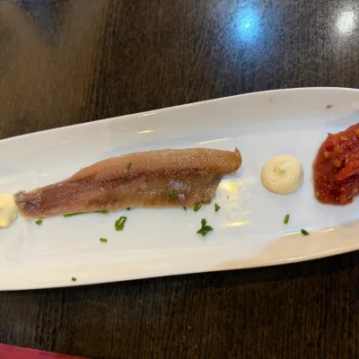 Sardinas ahumadas en Taberna Gallega O'Candil Pulpería